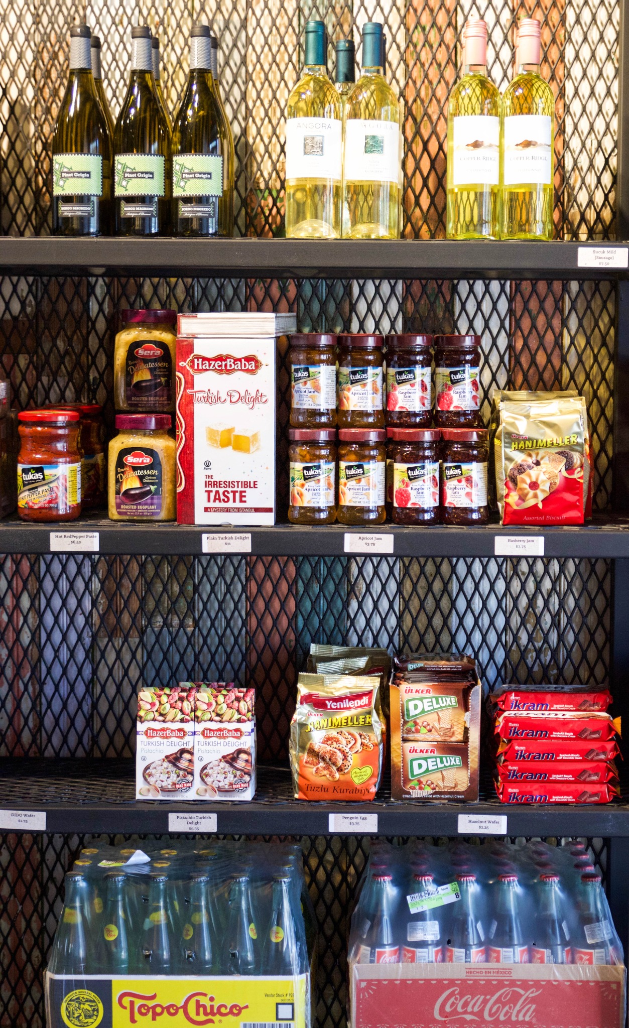 The Turkish market shelves at MezzeMe, stocked with coffee, tea, wafers, chocolate and other Turkish products